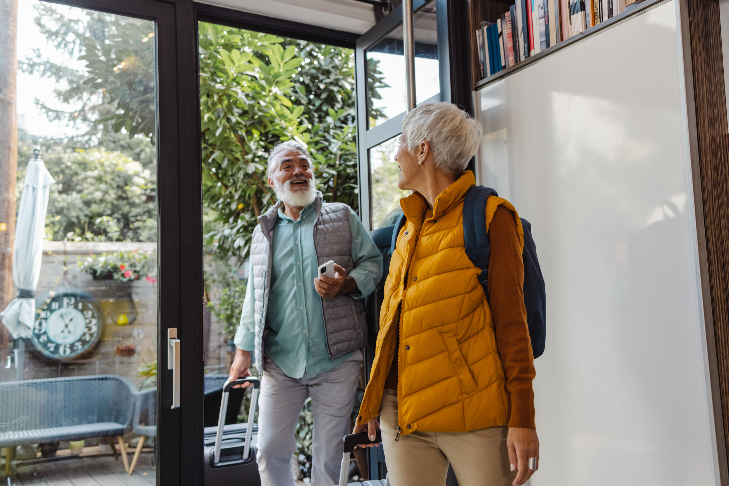 Senior tourists  arriving at vacation rental